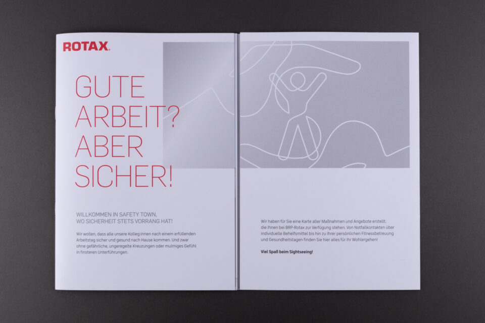 Folder über Sicherheit am Arbeitsplatz für Mitarbeiter·innen eines Herstellers von Antriebssystemen für Powersportpodukte