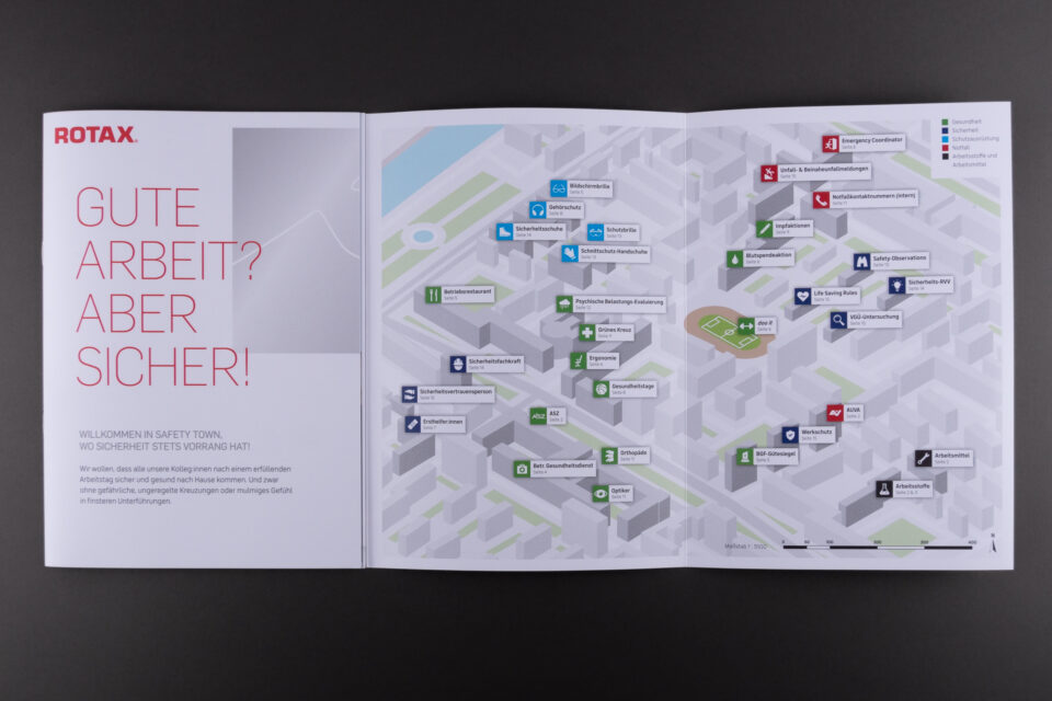 Folder über Sicherheit am Arbeitsplatz für Mitarbeiter·innen eines Herstellers von Antriebssystemen für Powersportpodukte