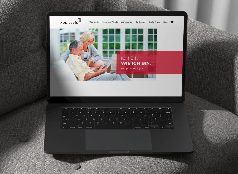 Startseite PAUL LEVIN Website am Laptop.