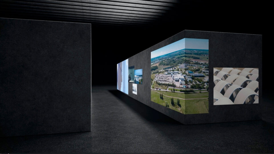 3D Logo von Wietersdorfer in Betonoptik mit Filmprojektionen